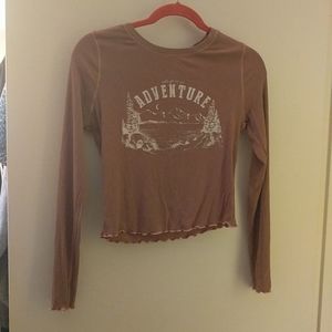 Light brown long sleeve stitch and pine shirt with pink stitched edging
